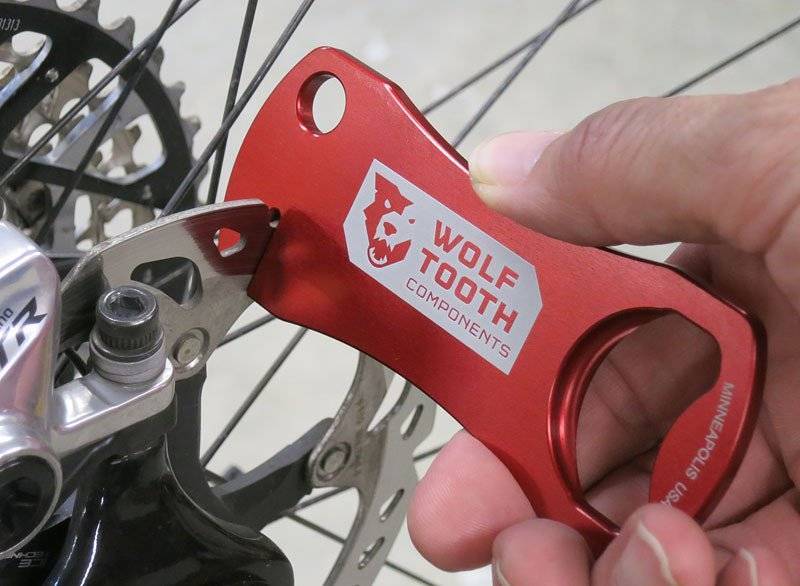 Bottle Opener With Rotor Truing Slot